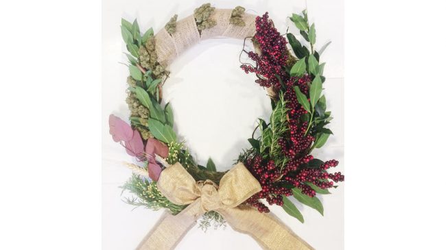 la-lb-media-wreath-20171204-115545